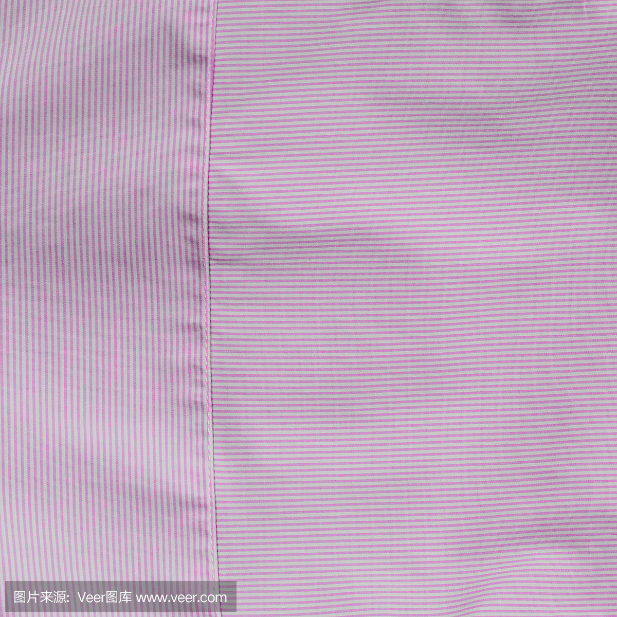 棉纺织材料,白色和粉红色条纹分开的背景